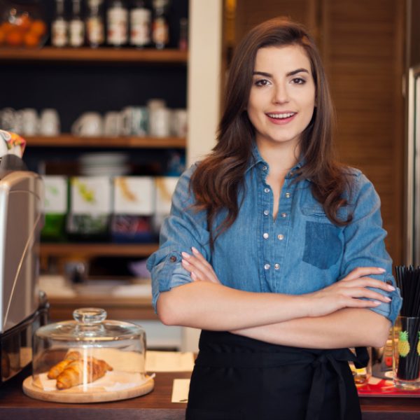 Portrait of friendly waitress at work