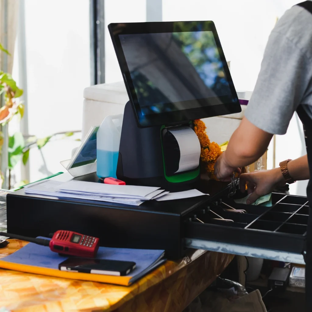 peran mesin kasir dalam kegiatan usaha